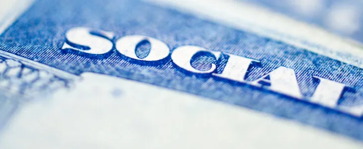 close-up, stylized, and blue-tinted photo of the word 